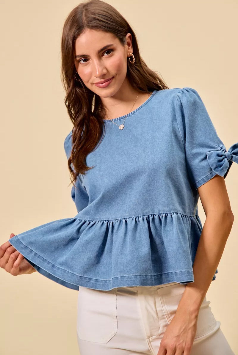 Denim bow detail peplum top from Thread Bar Boutique with flattering waist-defining silhouette