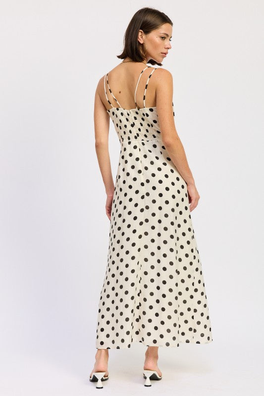 Flowy maxi dress with classic polka dot print and fitted bodice rear view Thread Bar Boutique