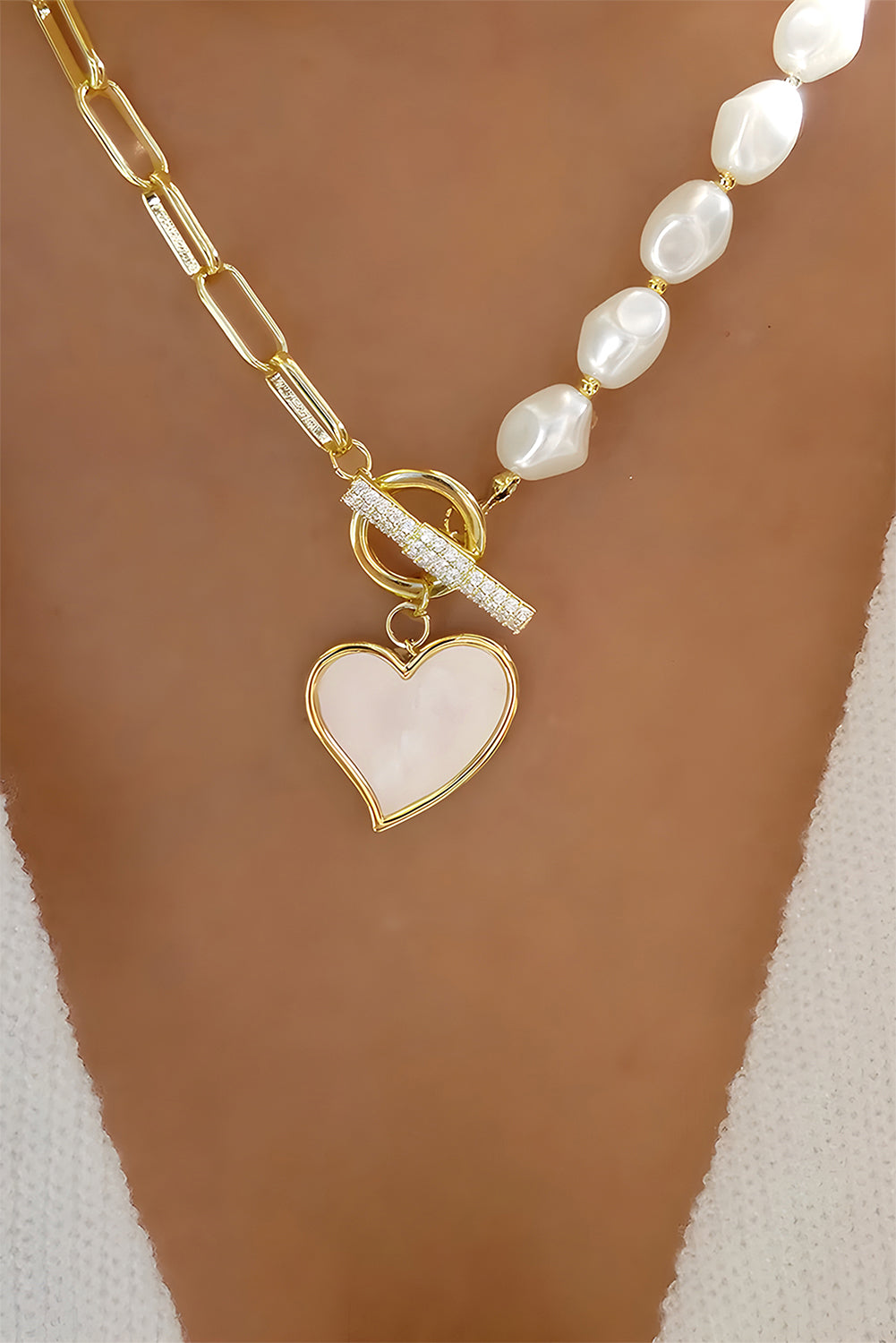 Necklace with a heart-shaped pendant on a mannequin