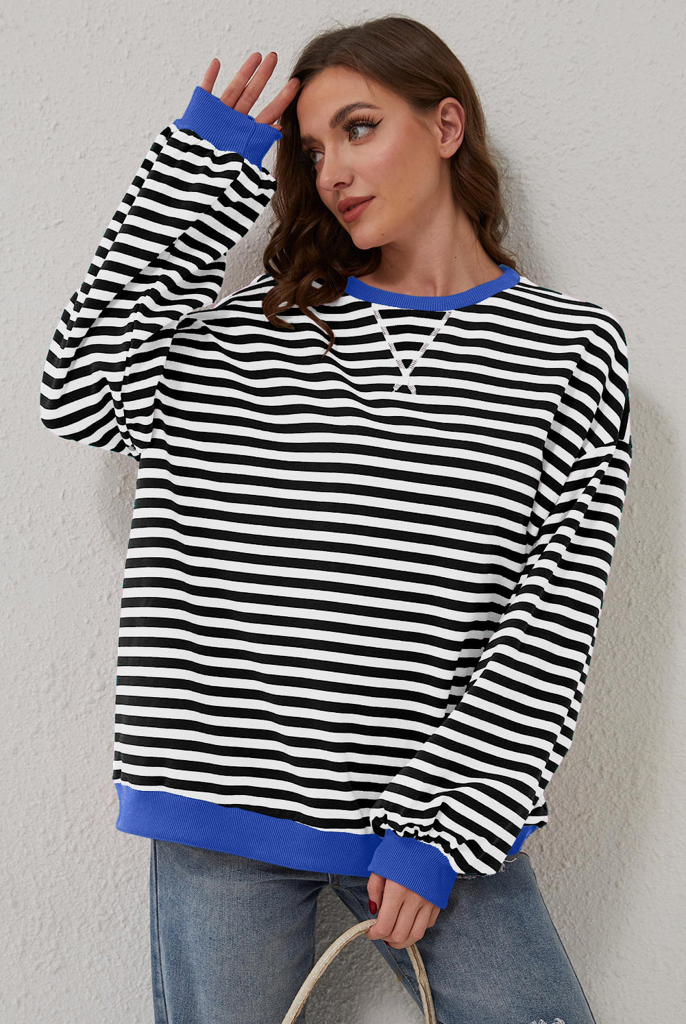 Women’s Casual Cool Stripe Oversized Sweatshirt with drop shoulder and contrast trim in relaxed fit, styled with denim