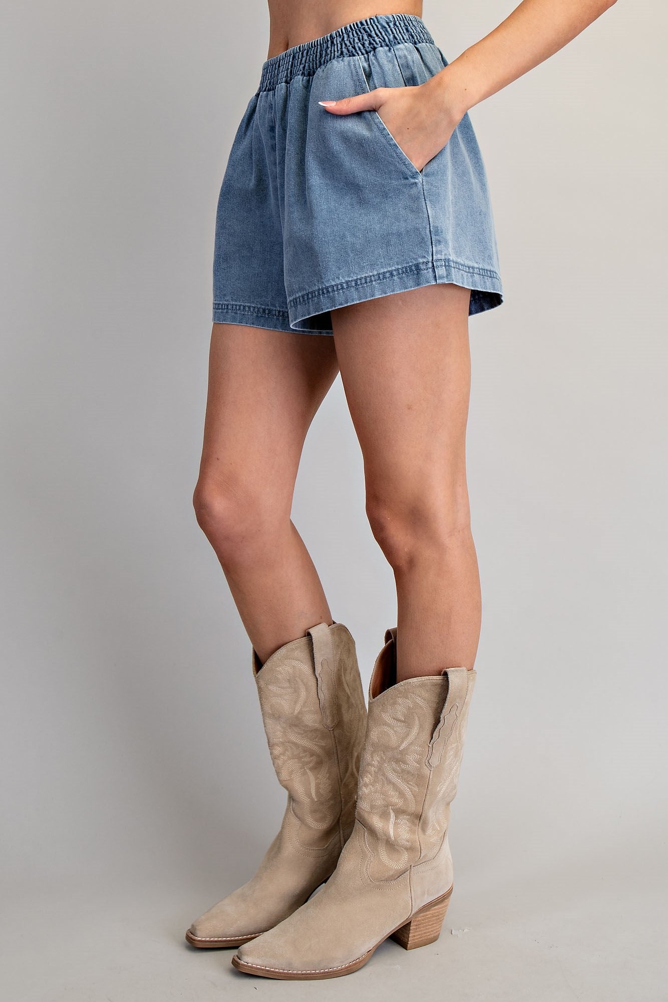 Light wash denim sleeveless A-line top and elastic waist shorts set for women from Thread Bar Boutique