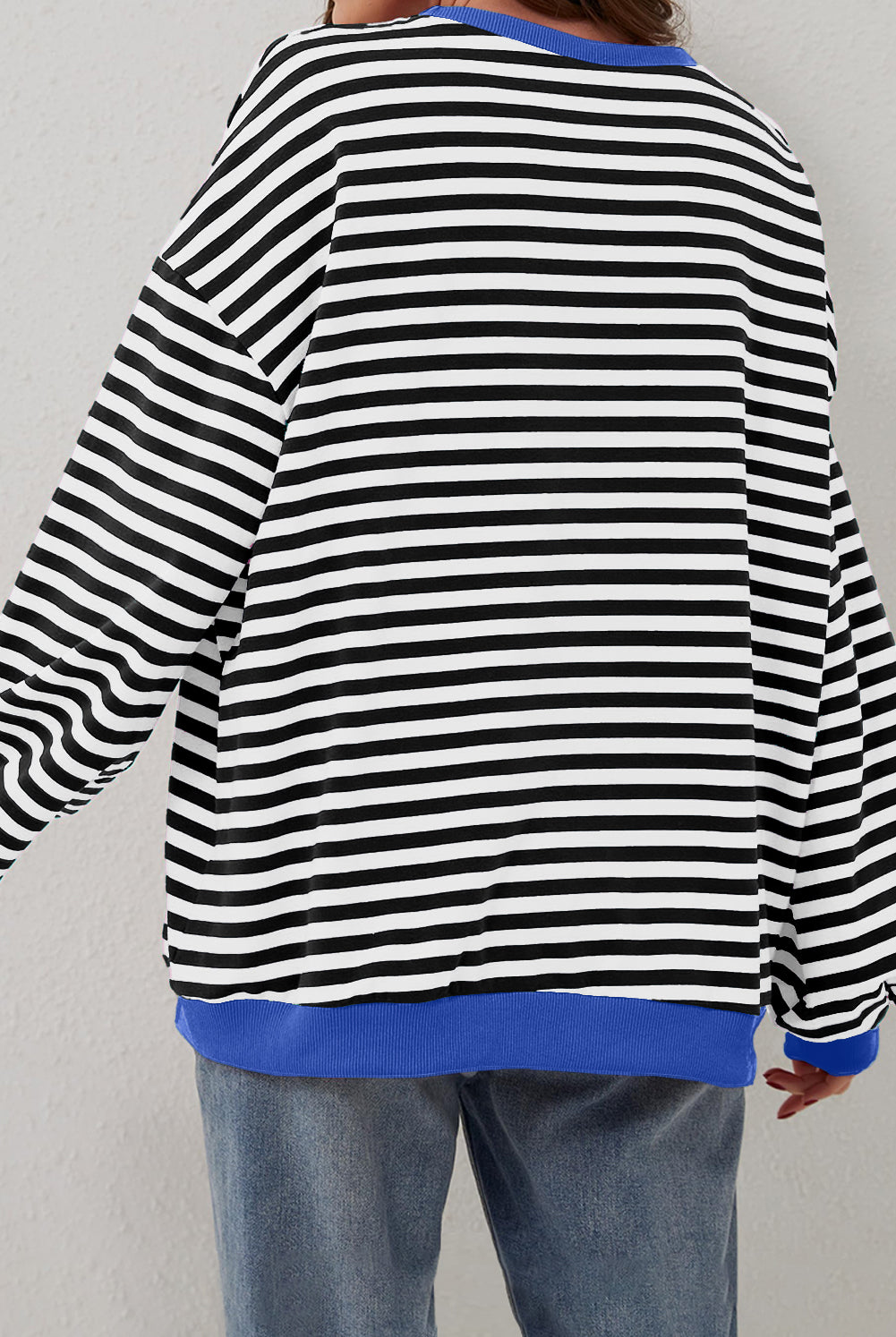 Women’s Casual Cool Stripe Oversized Sweatshirt with drop shoulder and contrast trim in relaxed fit, styled with denim