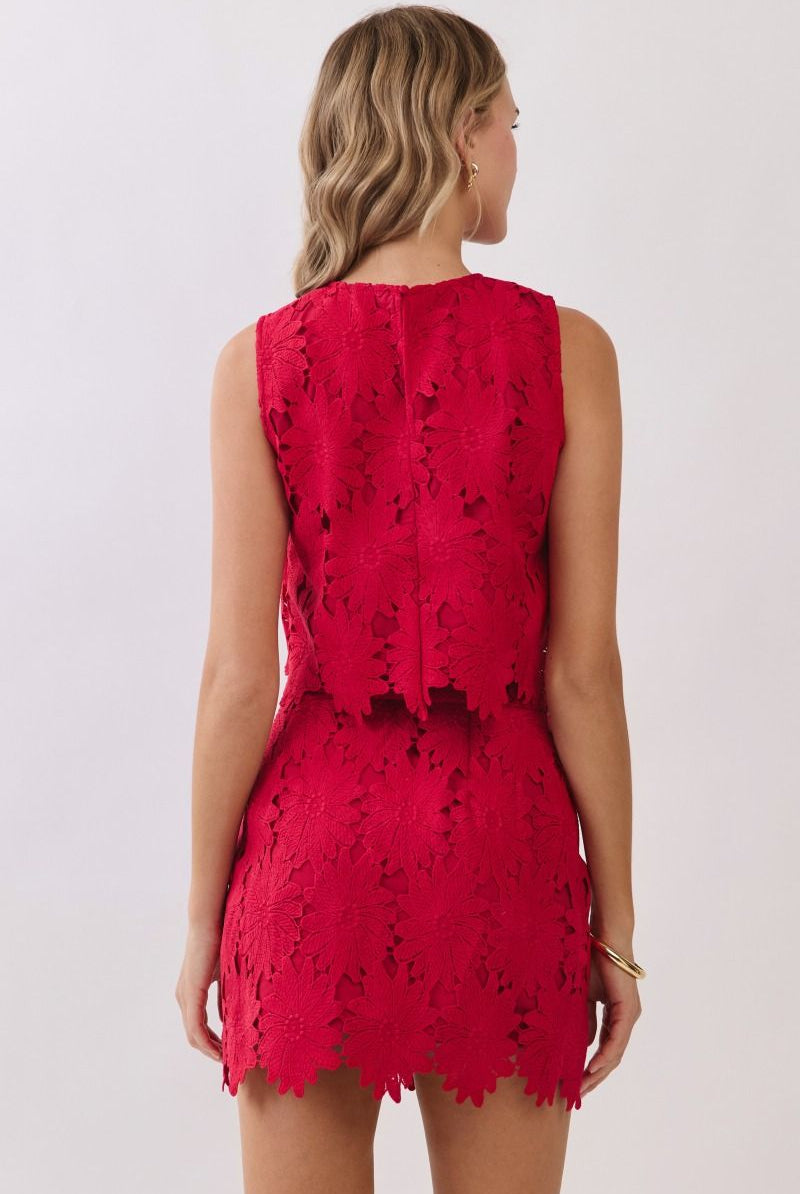 Women’s floral lace two-piece set featuring a sleeveless crop top and matching high-rise mini skirt with scalloped hems