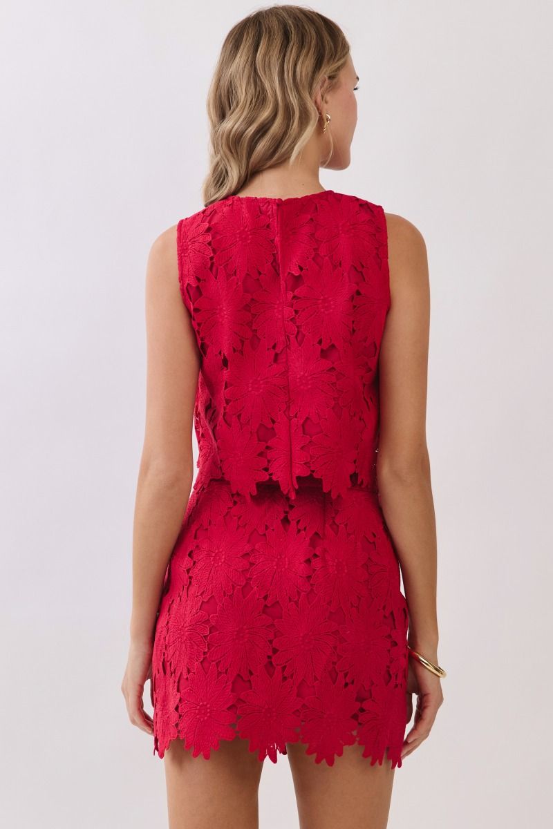 Women’s floral lace two-piece set featuring a sleeveless crop top and matching high-rise mini skirt with scalloped hems