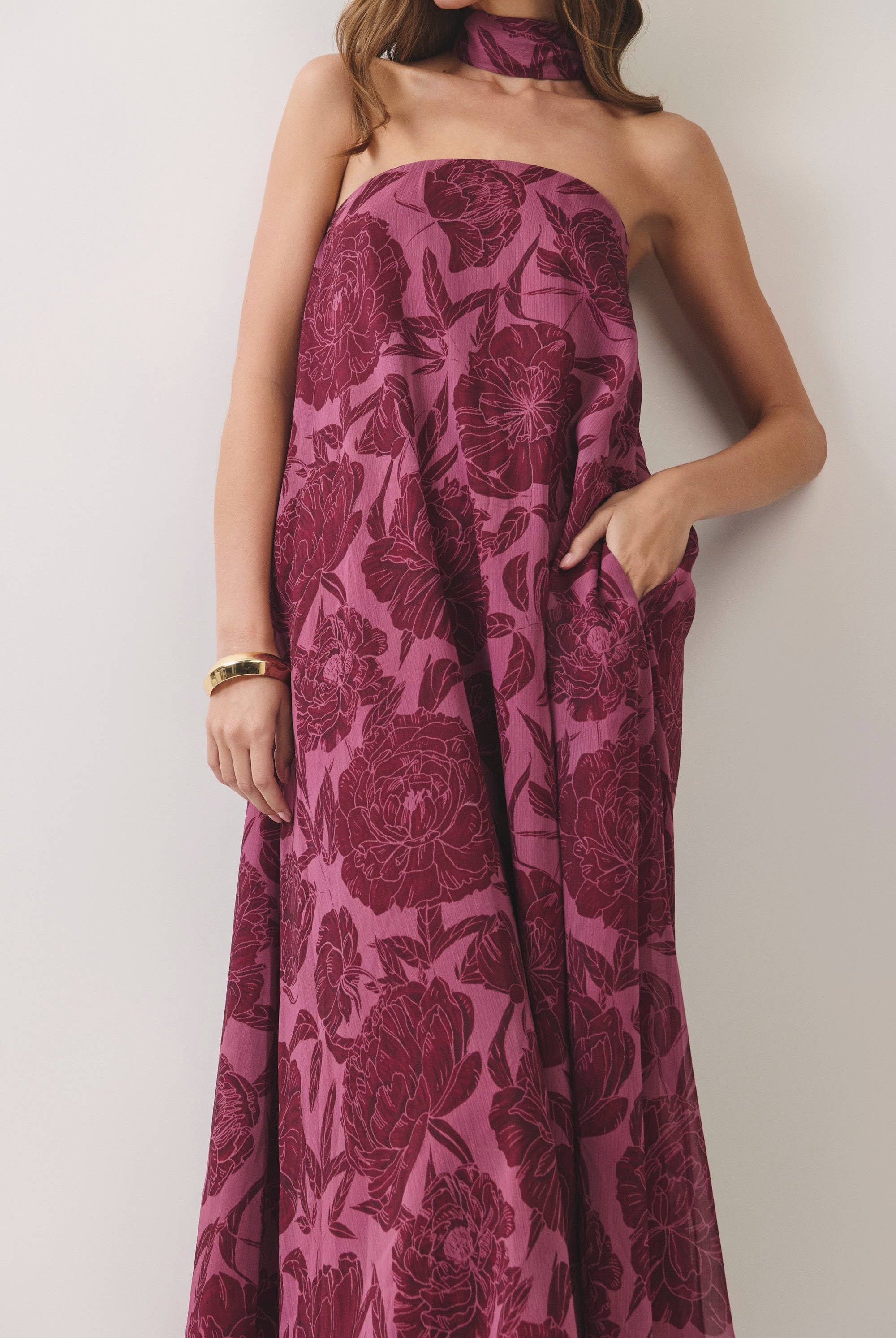 Flowy strapless floral maxi dress with oversized blooms, detachable scarf, hidden side pockets, relaxed A-line fit, and lined lightweight fabric