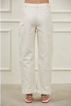 Structured high-rise barrel leg pants with full-length side panel seams, belt loops, button zipper closure, and front pockets