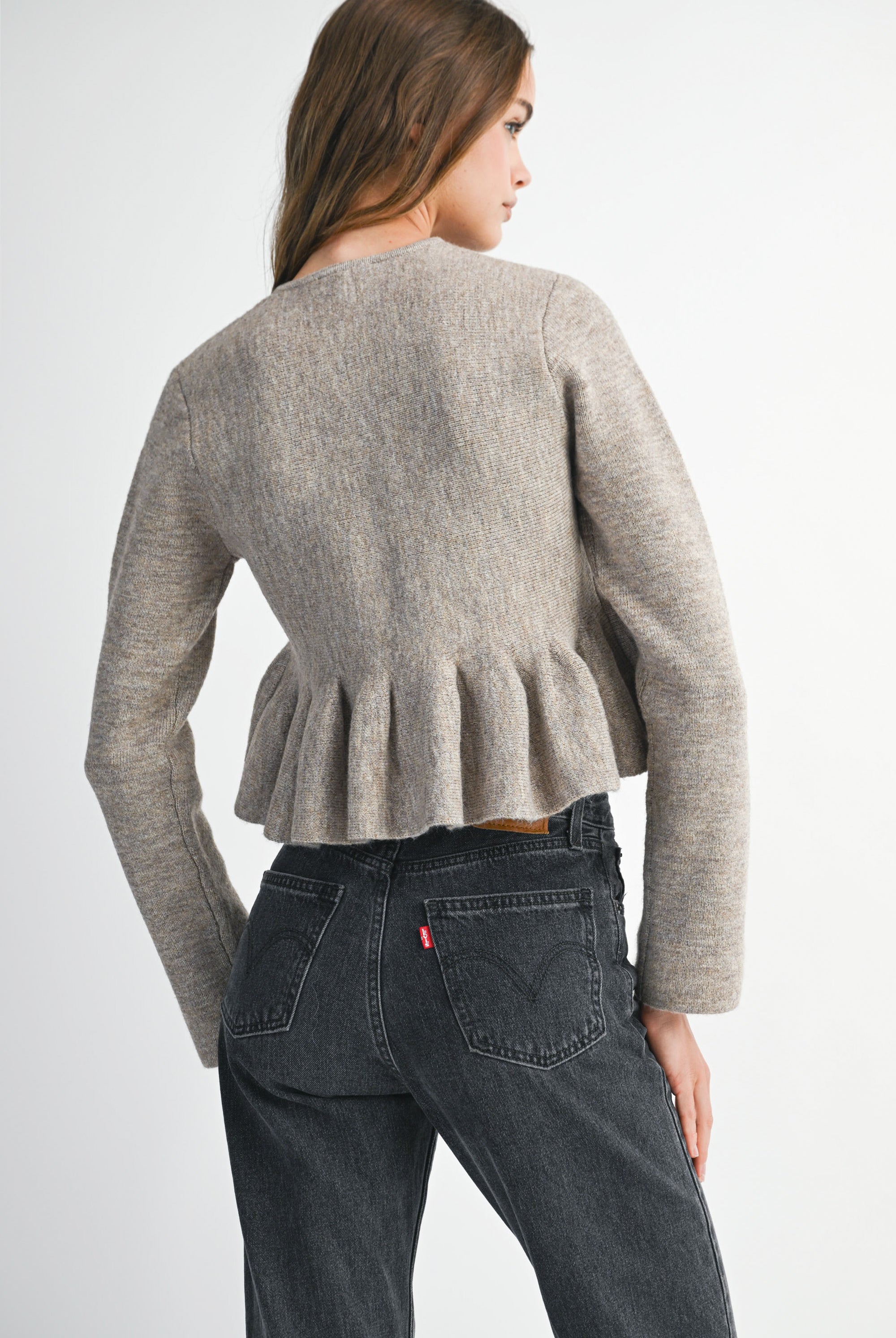 Soft taupe button-down knit peplum jacket with defined waist, cozy and elegant everyday layering piece.