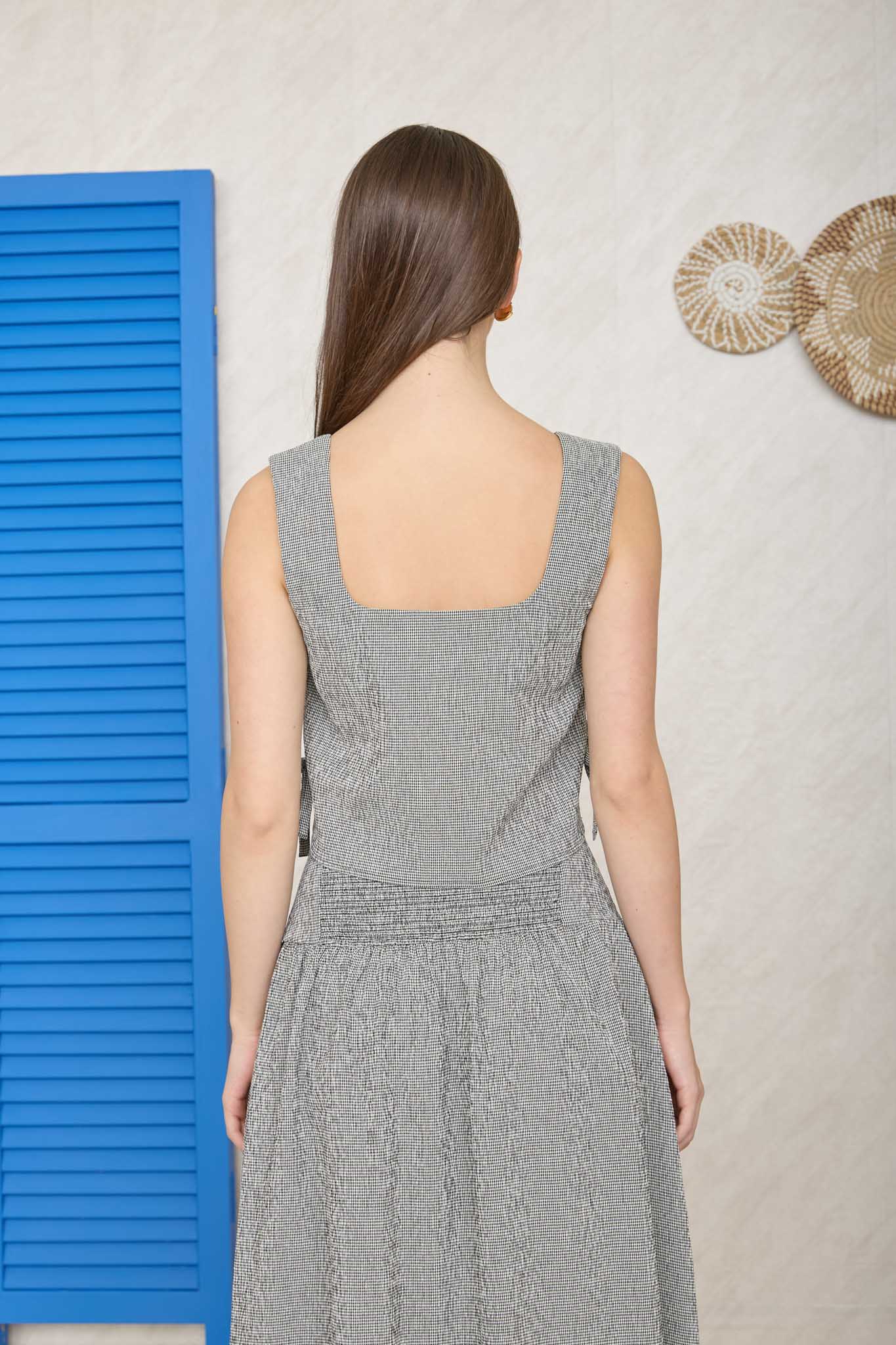 Two-piece black summer set with sleeveless top and high waist skirt