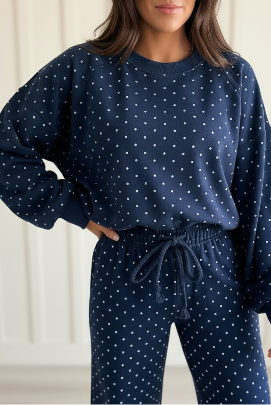 Casual polka dot matching set featuring a round-neck long-sleeve top with ribbed cuffs and coordinating drawstring waist pants