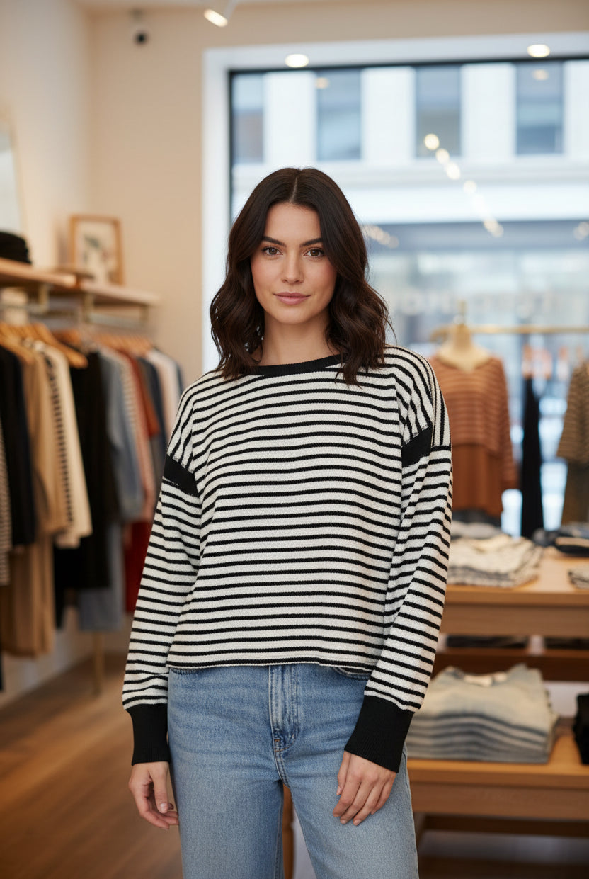 Women's striped knit long sleeve top with contrast trim, relaxed fit, drop shoulders, and round neckline, styled for casual everyday wear from Thread Bar Boutique.