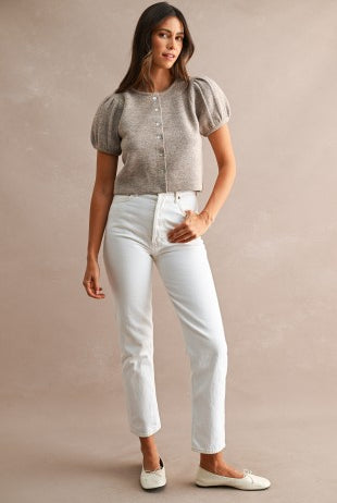 Women's button front sweater styled as a layering piece over a fitted top, featuring short puff sleeves, relaxed fit, crew neckline, and versatile knit construction.