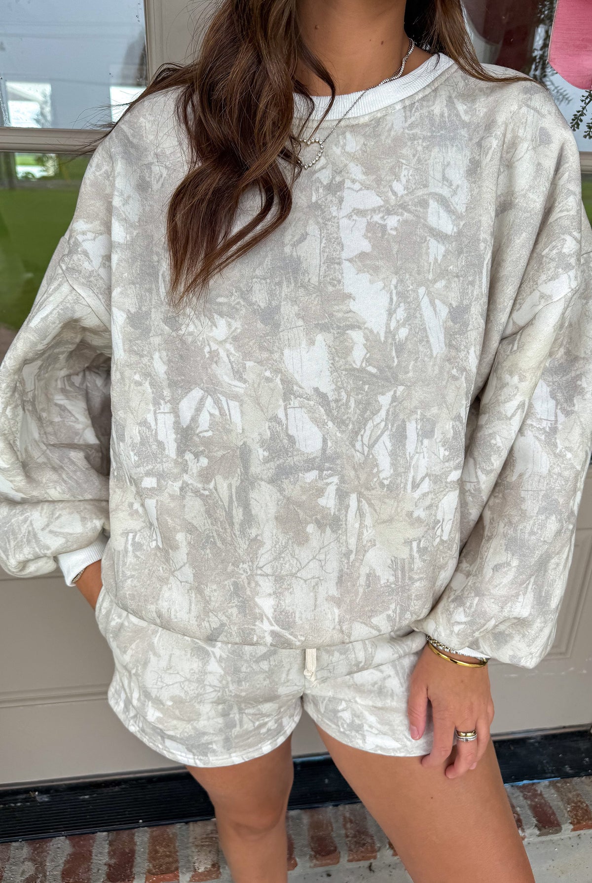 Woodland camouflage loungewear set for women with soft velvety long sleeve top, balloon sleeves, and matching shorts
