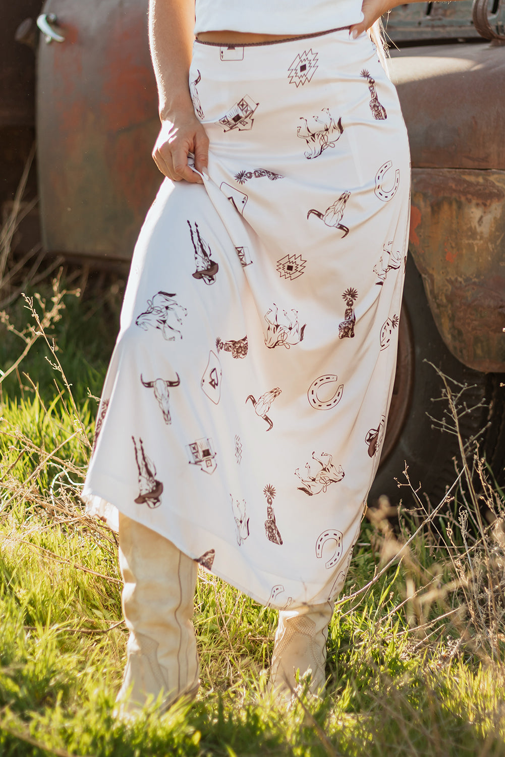 brown western print on a sating cream skirt