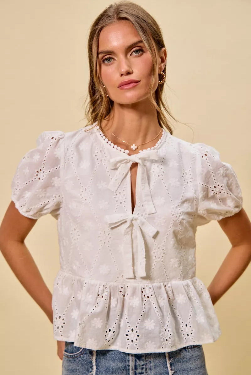 Thread Bar Boutique cotton eyelet summer top featuring delicate embroidery and lightweight breathable fabric for everyday wear.