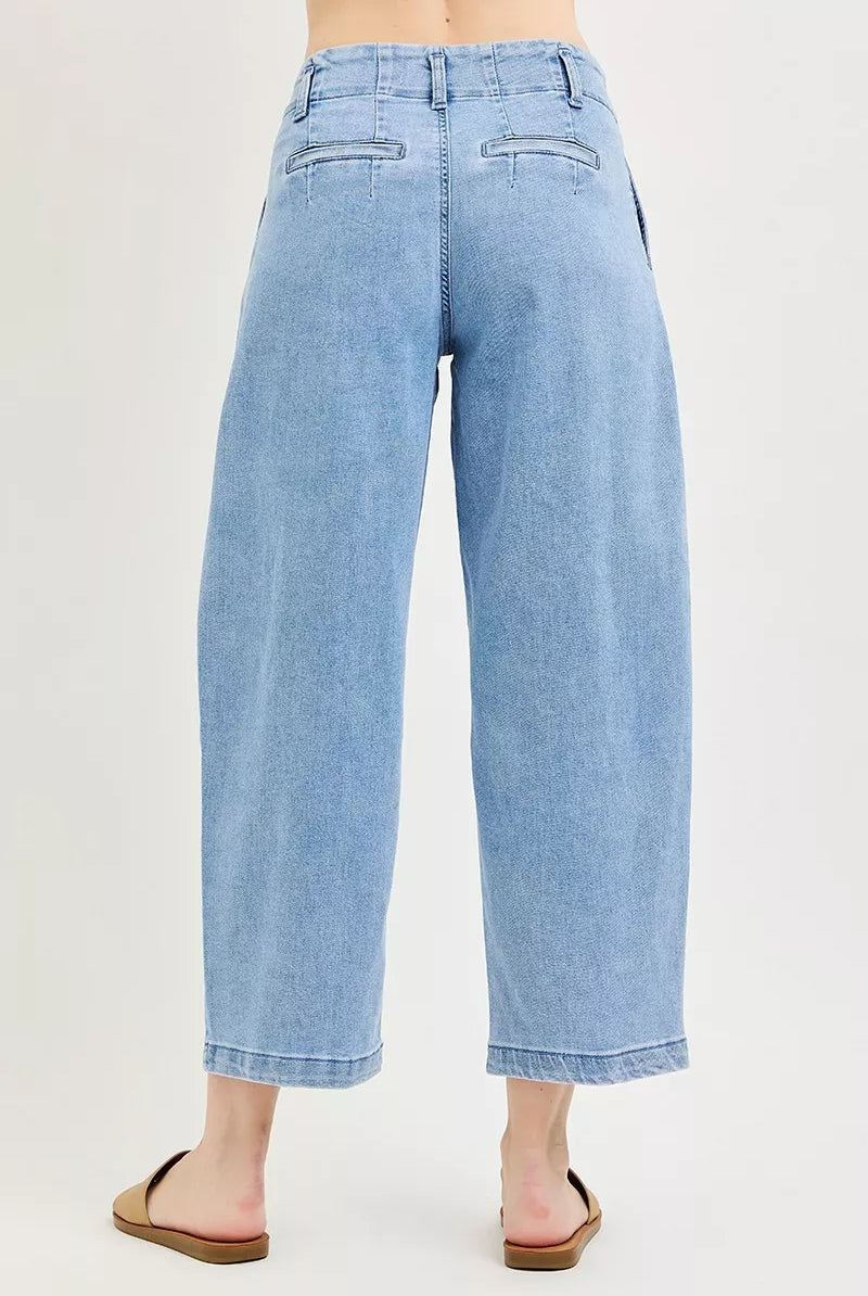 Rear view Risen medium wash slouchy crop barrel pleated jeans. Slight stretch, sizes 0–15, tailored pleated detail. Modern vintage denim at Thread Bar Boutique.