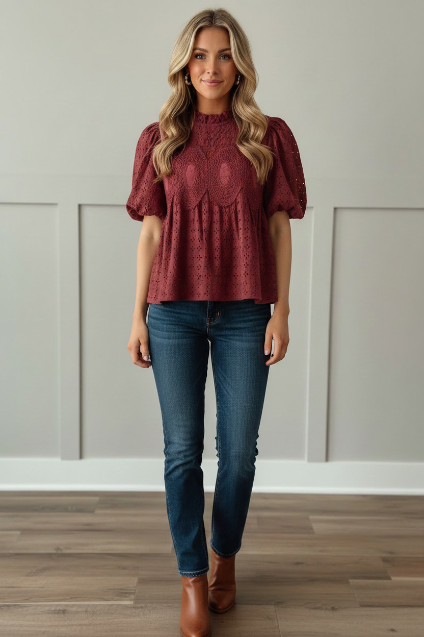 Cranberry burgundy 100% cotton eyelet puff sleeve blouse with ruffled mock neckline and ornate crochet medallion detail on front bodice, front view