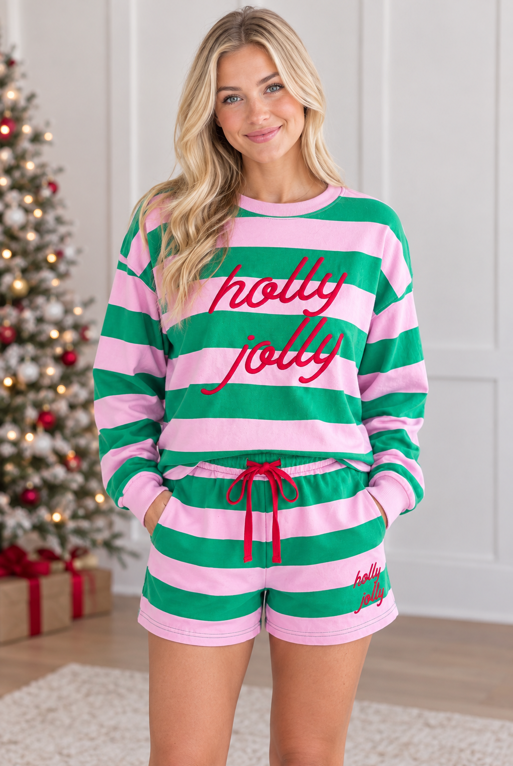Front view of pink and green Holly Jolly embroidered stripe pullover and matching shorts with red drawstring