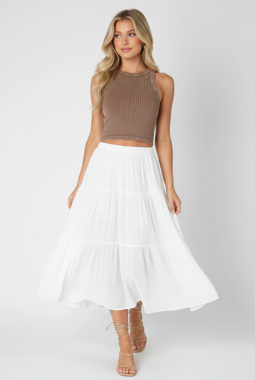 NIKIBIKI mocha seamless ribbed tank top styled with flowy white midi skirt and strappy sandals, buttery soft one-size layering top made in USA at Thread Bar Boutique
