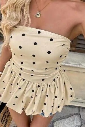 close up of polka dot strapless peplum top