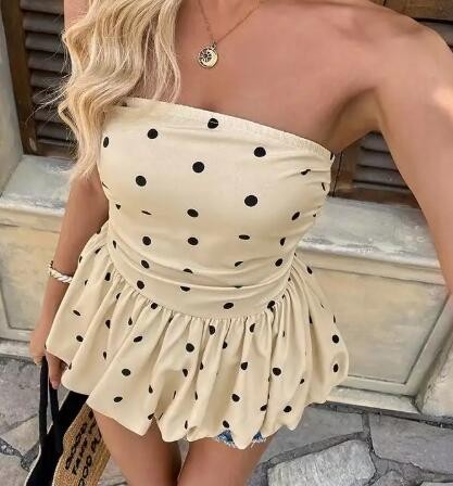 close up of polka dot strapless peplum top
