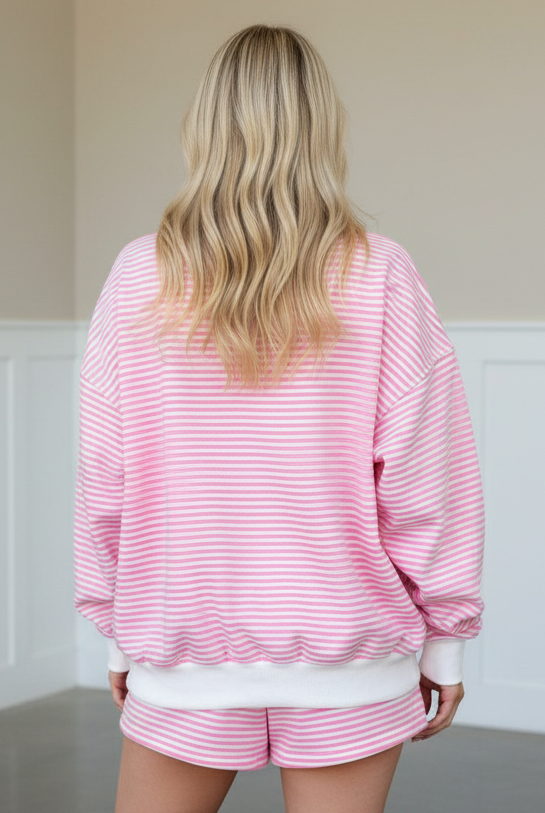 Pink stripe two-piece lounge set with oversized mock neck sweatshirt and shorts