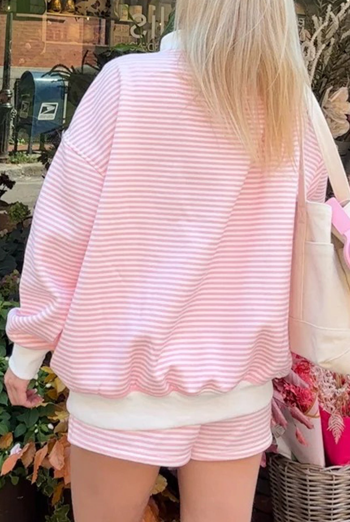 Women’s pink striped sweatshirt and shorts set with relaxed oversized fit