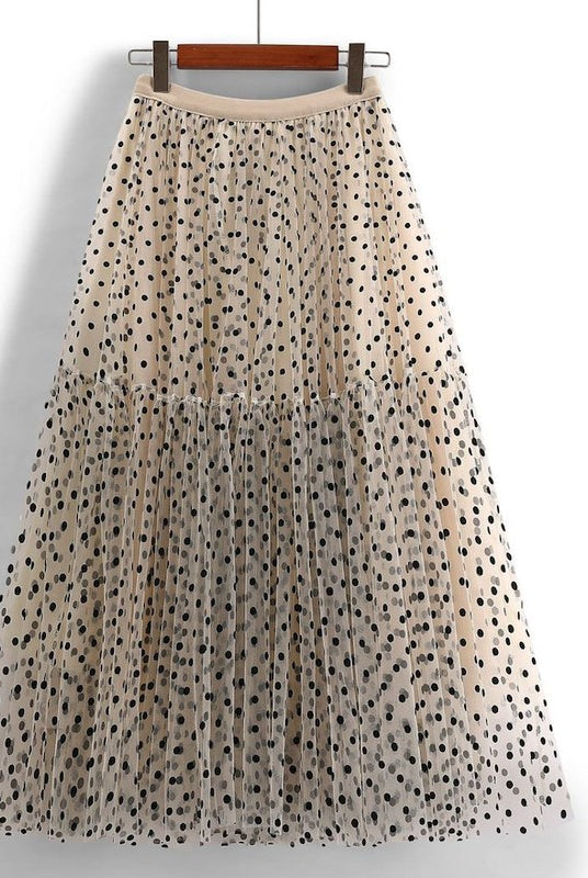 flat lay of khaki polka dot midi skirt