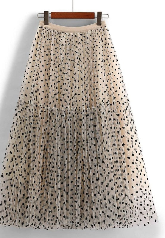 flat lay of khaki polka dot midi skirt