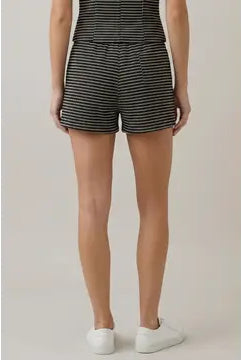 Striped women's shorts featuring a high-rise silhouette, contrast front buttons and horizontal micro-stripe texture, coordinating piece for a matching vest set