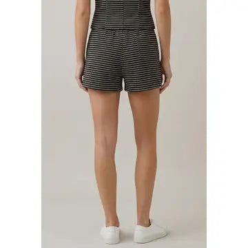 Striped women's shorts featuring a high-rise silhouette, contrast front buttons and horizontal micro-stripe texture, coordinating piece for a matching vest set