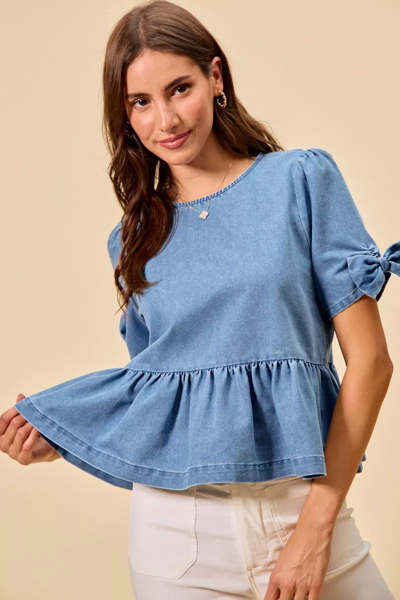 Denim bow detail peplum top from Thread Bar Boutique with flattering waist-defining silhouette