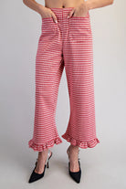 Red and white checkered pants with ruffled hem wiht high waist and front pockets