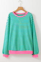 Women’s Casual Cool Stripe Oversized Sweatshirt with drop shoulder and contrast trim in relaxed fit, styled with denim