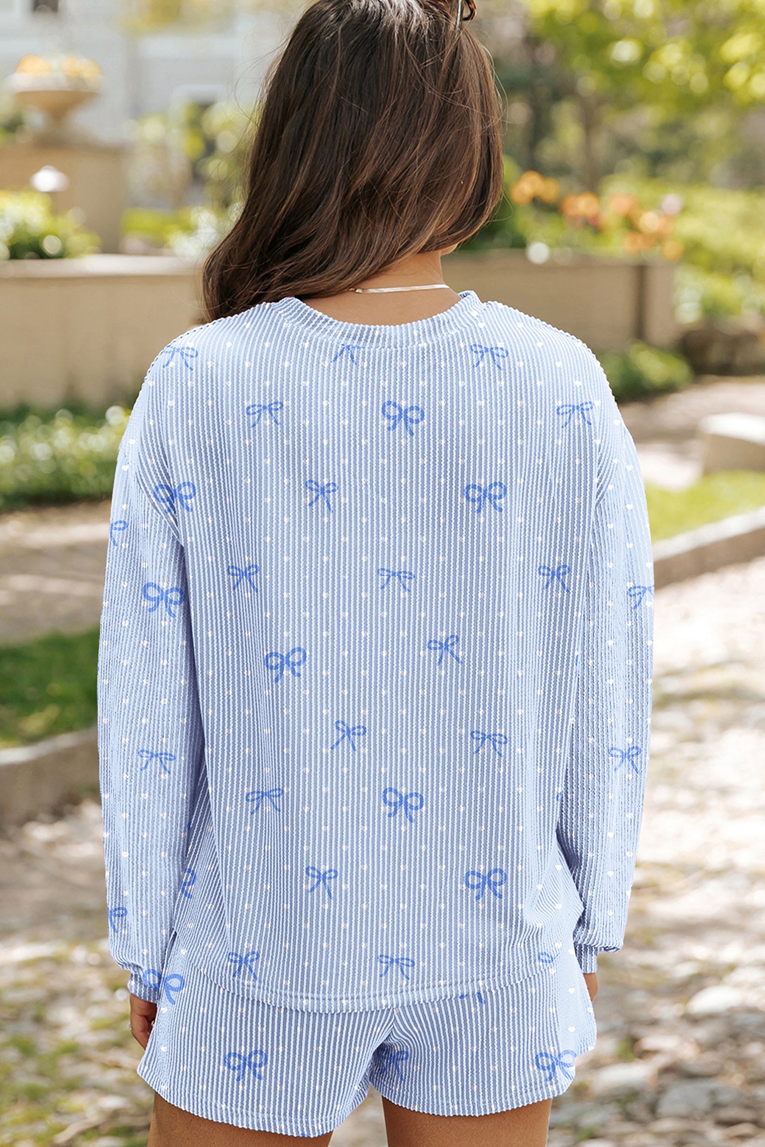 Women’s heart and bow print ribbed lounge set with long sleeve top and matching shorts back view