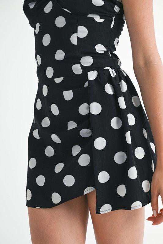 Strapless ruched polka dot mini dress from Thread Bar Boutique with flattering body-hugging fit close up