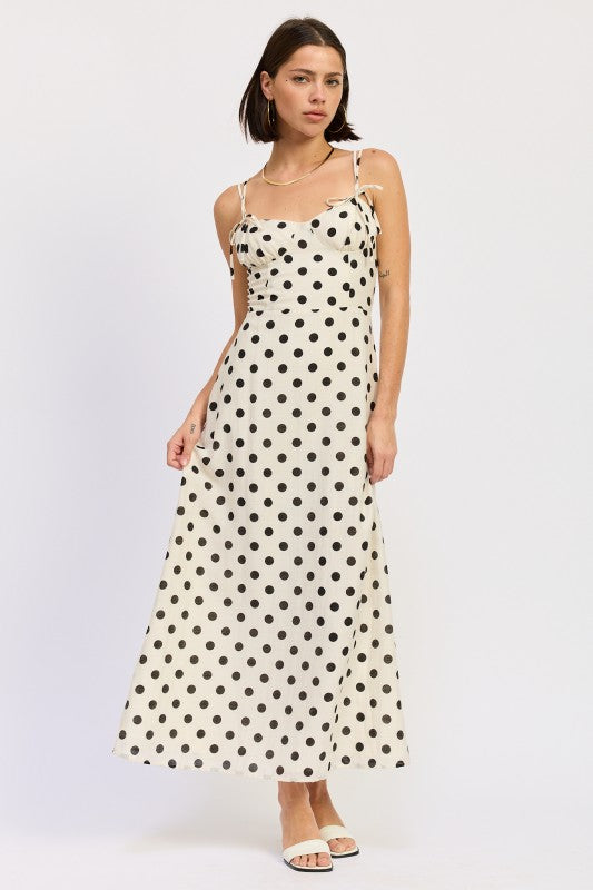 Cream polka dot bustier maxi dress with ties on straps and bustier. Thread Bar Boutique