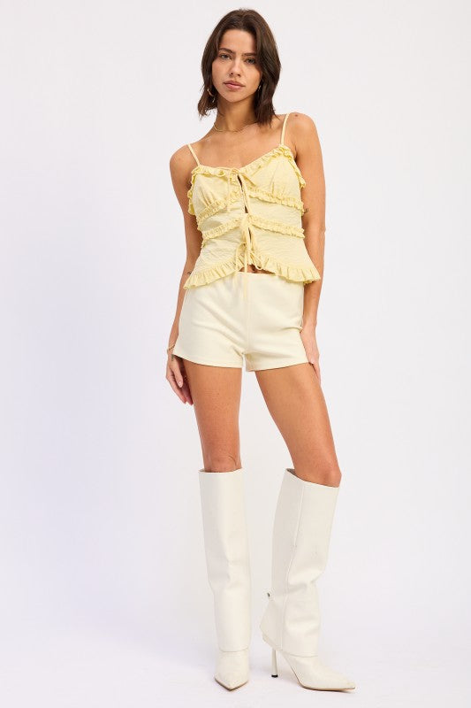 Delicate spaghetti strap top with flattering adjustable fit butter yellow
