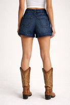 Sparkly rhinestone denim shorts by Thread Bar Boutique made in USA with classic button closure and vintage rolled cuffs for western concert outfits.