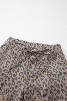 Women’s leopard print barrel leg cropped denim jeans with relaxed fit and ankle length