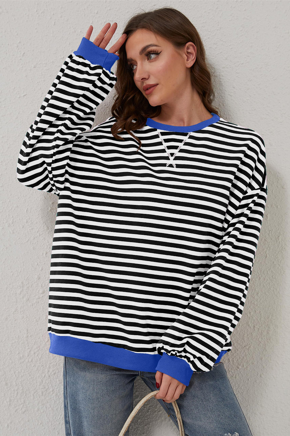 Women’s Casual Cool Stripe Oversized Sweatshirt with drop shoulder and contrast trim in relaxed fit, styled with denim