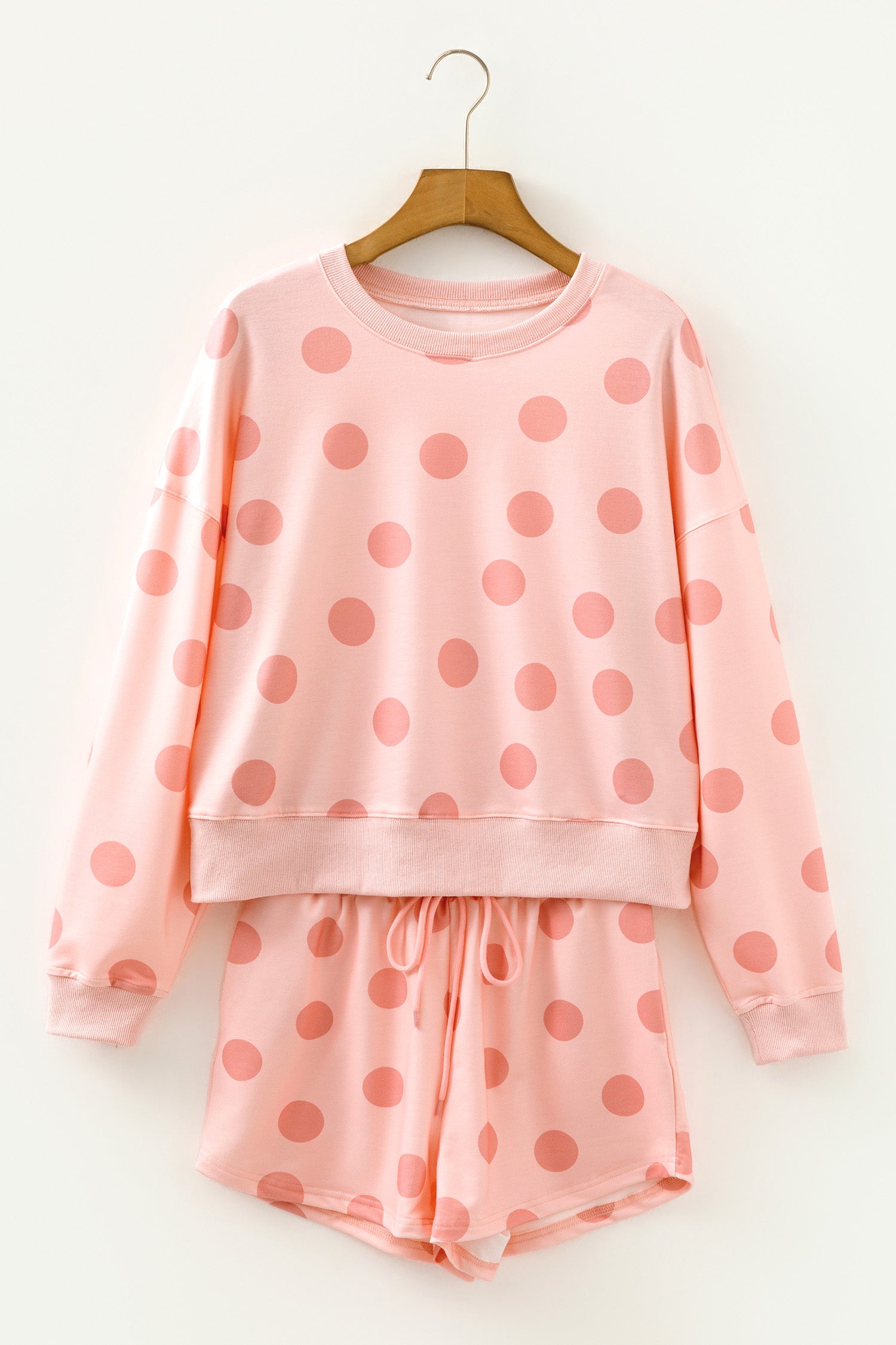 Polka dot lounge set with drop shoulder pullover and drawstring shorts hanger shot