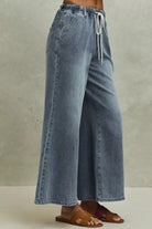 Mid rise elastic flare denim jeans with drawstring side view