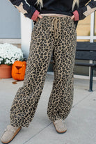 Trendy leopard print jeans styled outfit