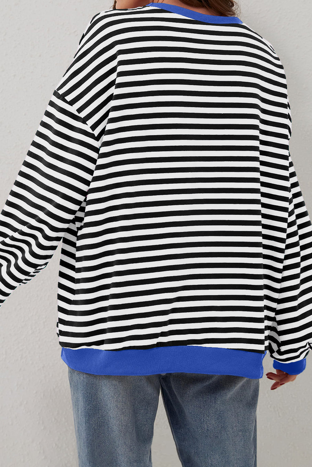 Women’s Casual Cool Stripe Oversized Sweatshirt with drop shoulder and contrast trim in relaxed fit, styled with denim