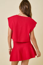 red knit v neck sweater cap sleeve with swing skirt worn as a set