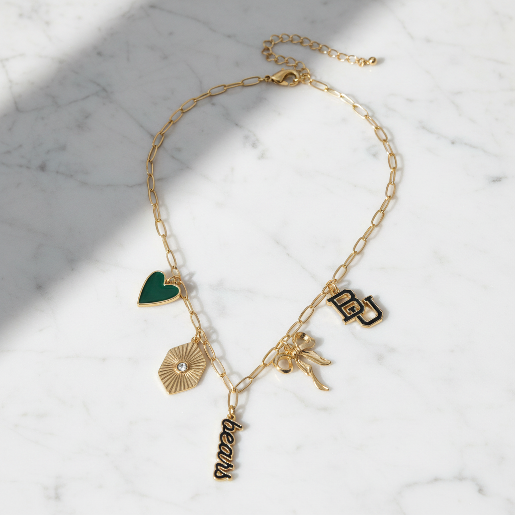 Baylor Bears charm necklace with gold paperclip chain, featuring green heart, BU logo, bow, and “Bears” script charms in 18K triple plated gold