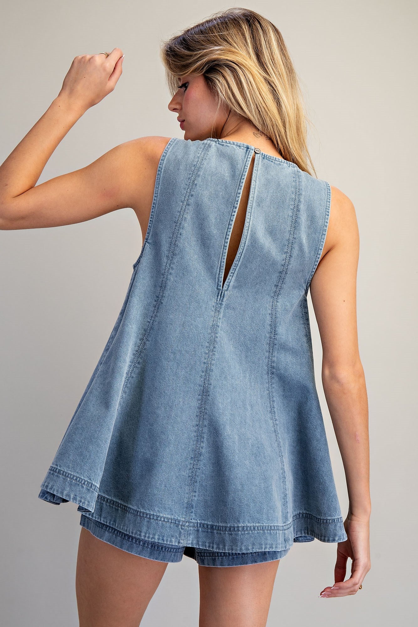 Light wash denim sleeveless A-line top and elastic waist shorts set for women from Thread Bar Boutique