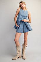 Light wash denim sleeveless A-line top and elastic waist shorts set for women from Thread Bar Boutique