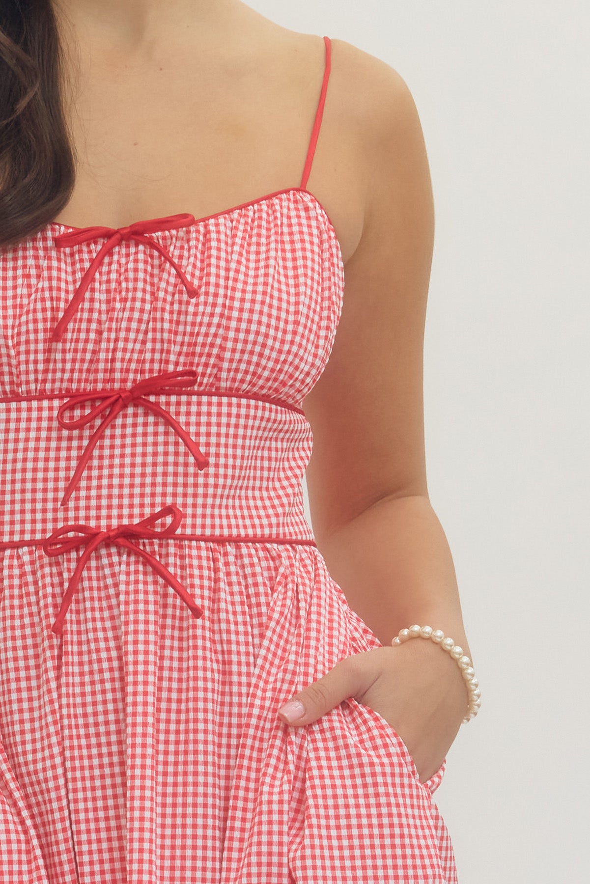 Red and white checkered dress with bow ties 