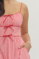 Red and white checkered dress with bow ties 